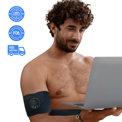 Man using EMS muscle stimulator on arm while working